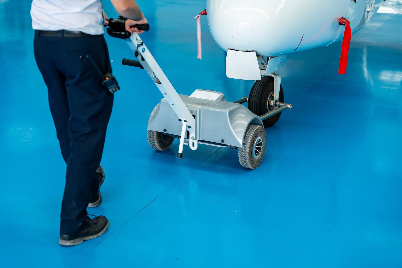 Glossy commercial floor coating in a hangar-style facility